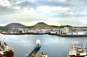 View of the city from the harbor. Webcams Heimaey