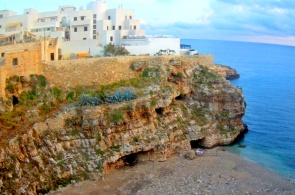 View of the beach and sea caves of Polignano. Bari webcams online